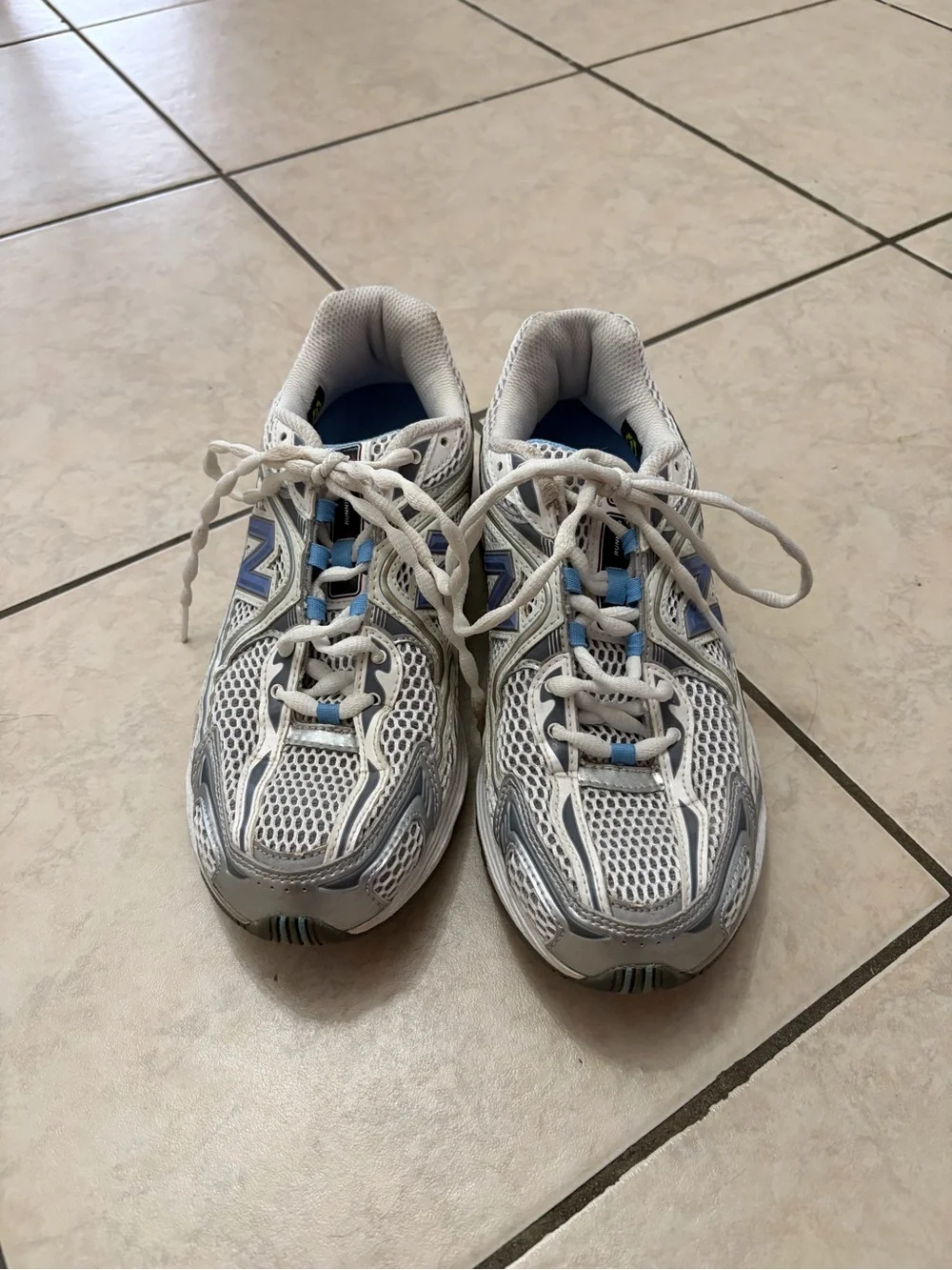 New Balance White and Light Blue Athletic Sneakers